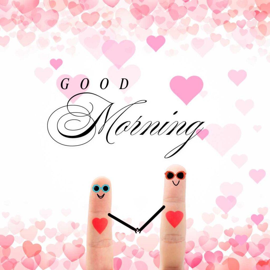 Two finger art characters wearing colorful sunglasses and holding hands, set against a white background framed by pink floating hearts.