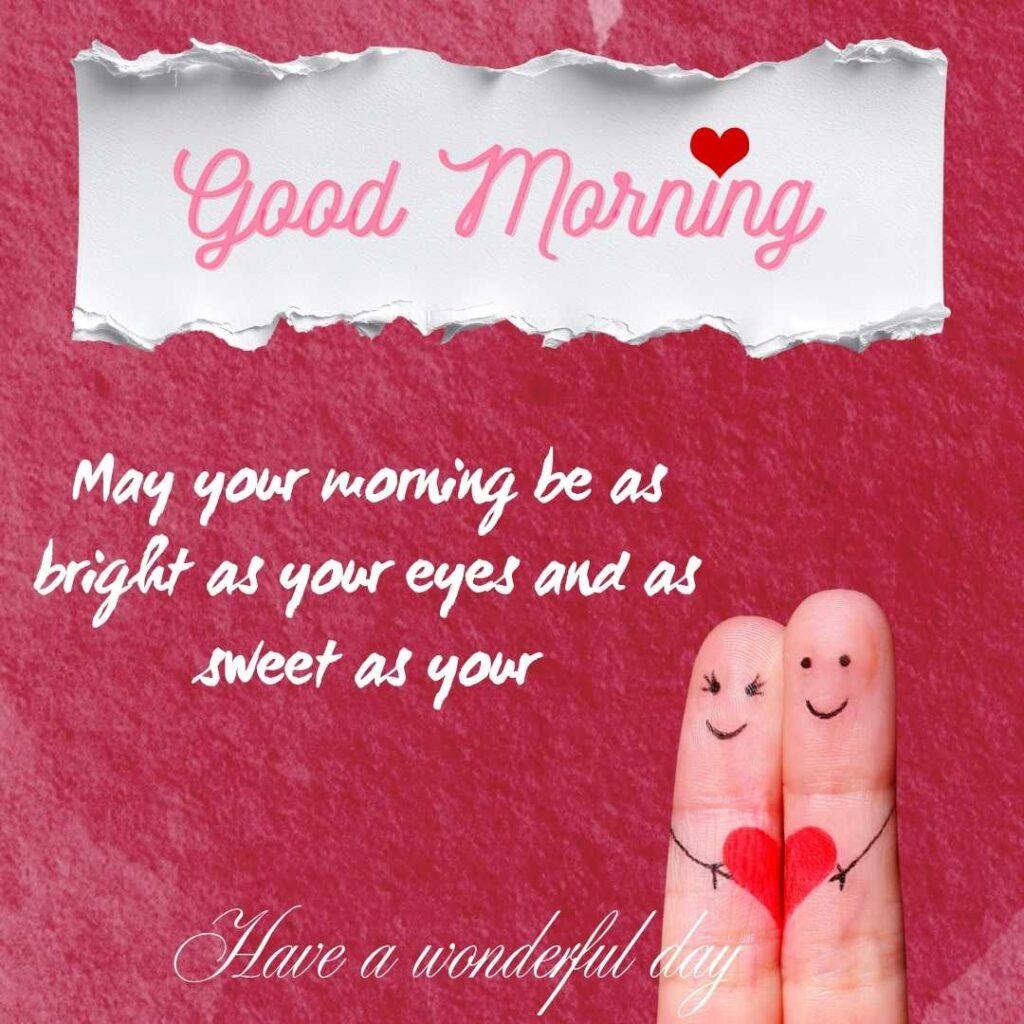 Two smiling finger characters holding a red heart on a textured pink background with a romantic morning greeting.